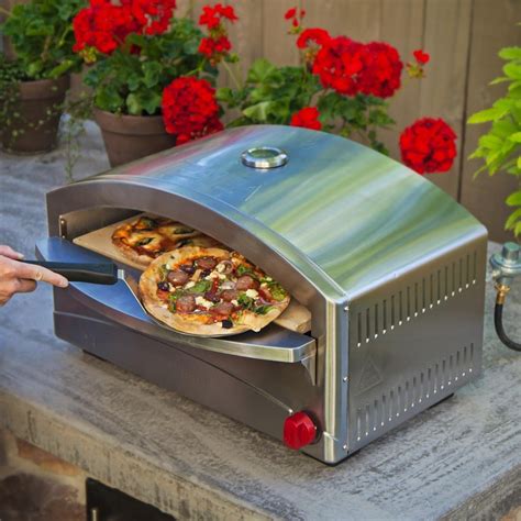 Perfect for <b>pizza</b>, baking breads, roasting meats and more, Double layered ceiling enhances heating dynamics, bakes like a brick <b>oven</b>, Preheat and ready to cook in 15 minutes, Built-in valve ignition/micro-adjust valve give you total flame control. . Best home pizza ovens